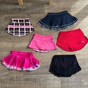 Skating/dance ruffle and straight skirt lot.